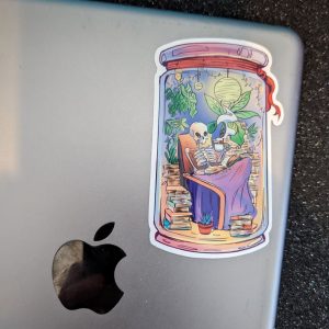 Cozy Skeletion In a Jar Sticker | Vinyl Sticker | Bookish stickers, Reading stickers, Skeleton stickers