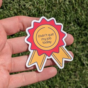 Daily Victory: "Didn't Quit My Job Today" Ribbon Sticker - Funny, Motivational Vinyl Decal for Laptops, Water Bottles, Planners