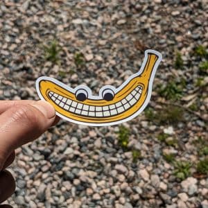 Smiling Banana Sticker - Cheerful Fruit Decal for Laptops, Notebooks, Kindles, etc