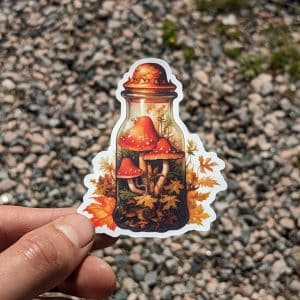 Autumn Mushrooms in a Bottle Sticker - Fall-themed Decal for Laptops, Kindles, and Nature Lovers