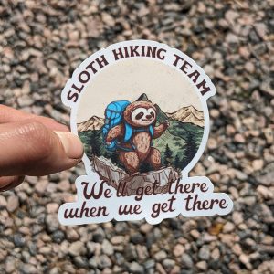 Funny Sloth Hiking Sticker - 'Sloth Hiking Team: We'll Get There When We Get There'